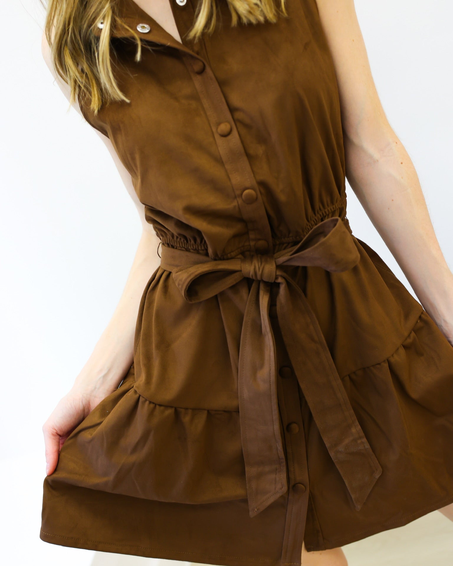 Brown dress with a belt on a white background