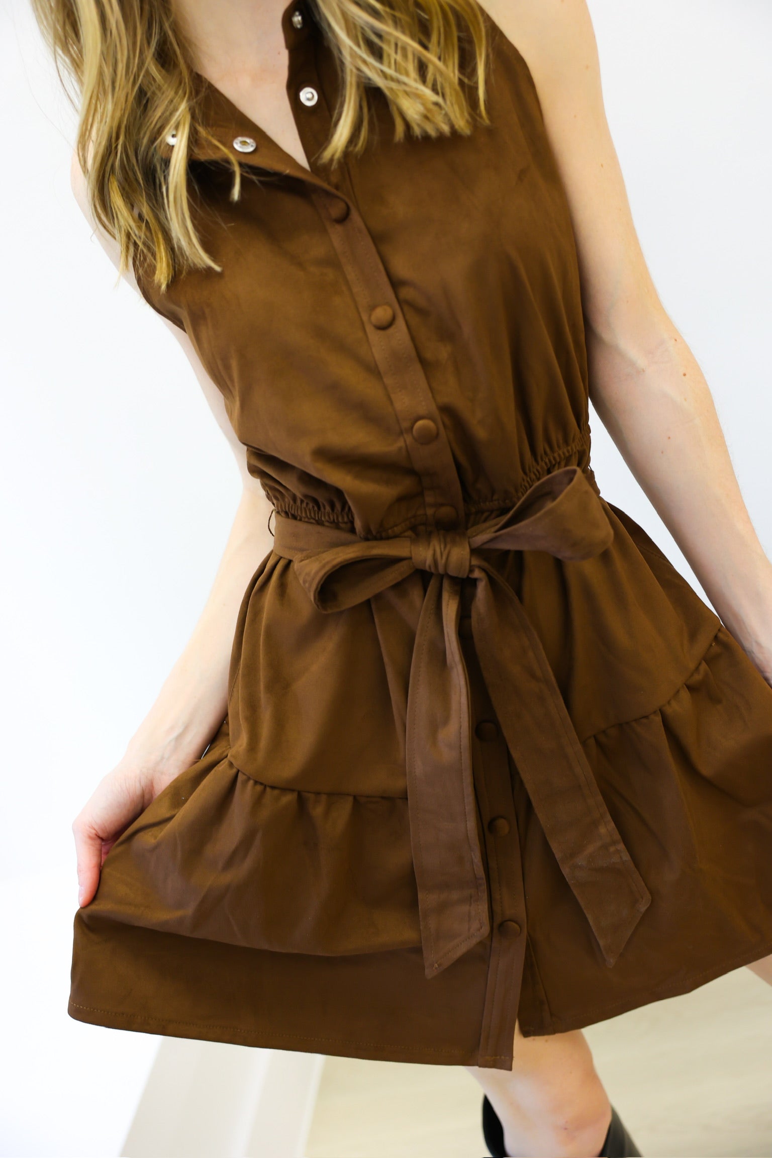 Brown dress with a belt on a white background