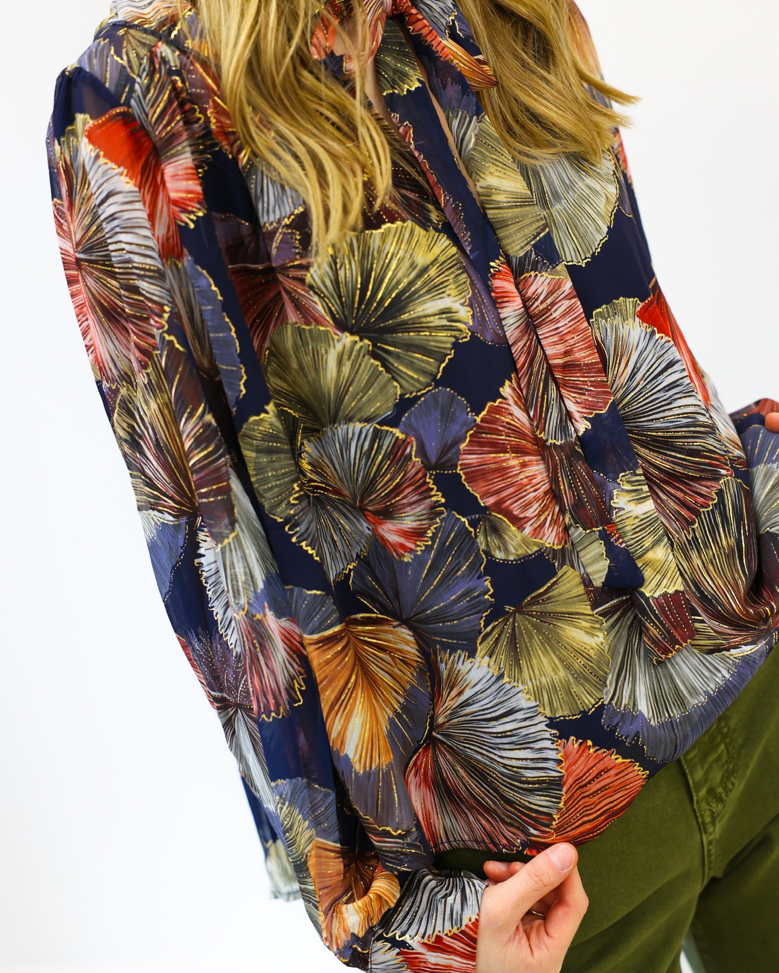 Colorful patterned shirt with a white background