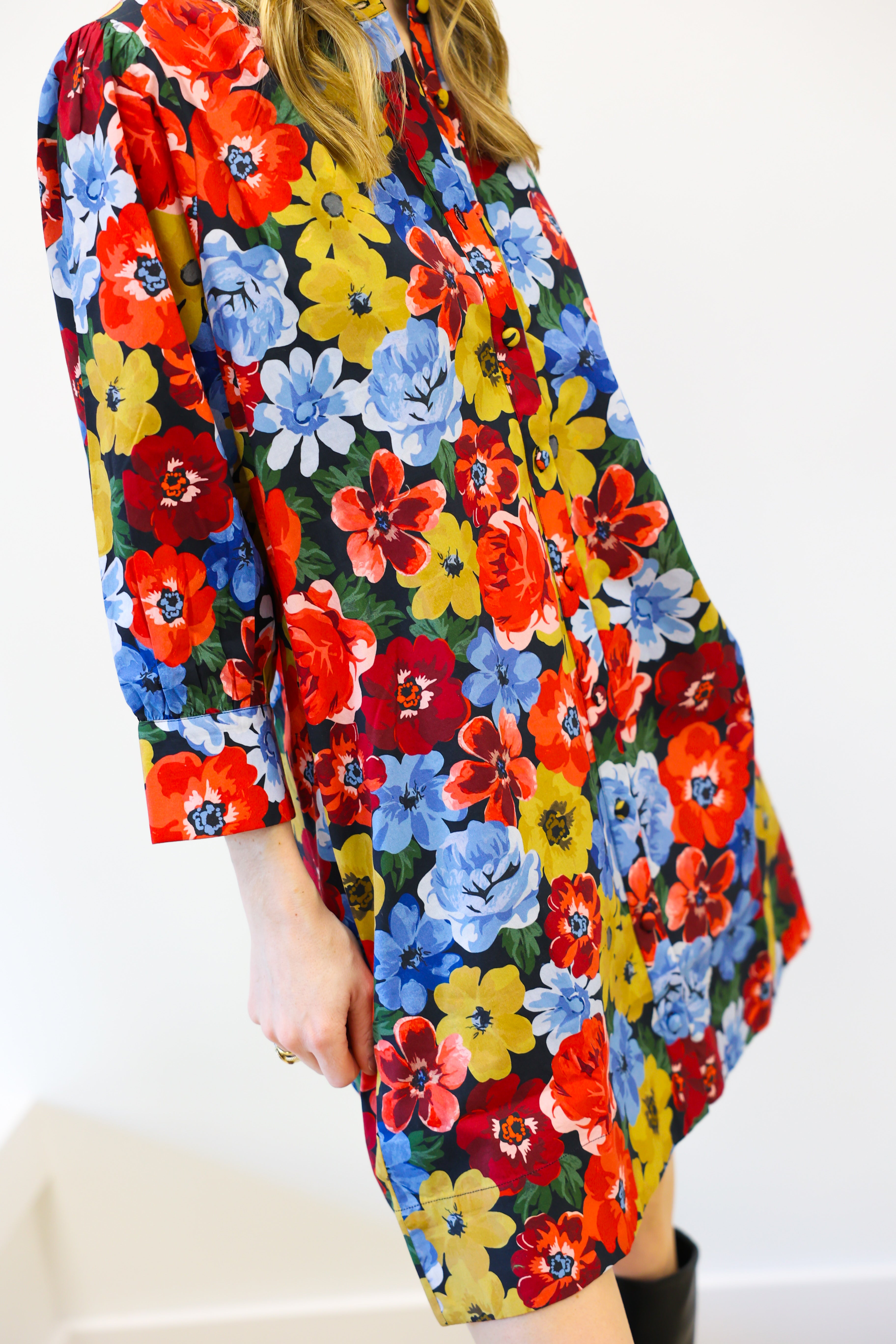 Colorful floral dress with a white background